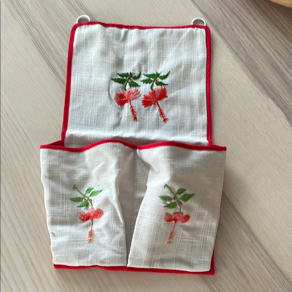 Handmade embroidered storage pouch from Fiji. Smoke free home.